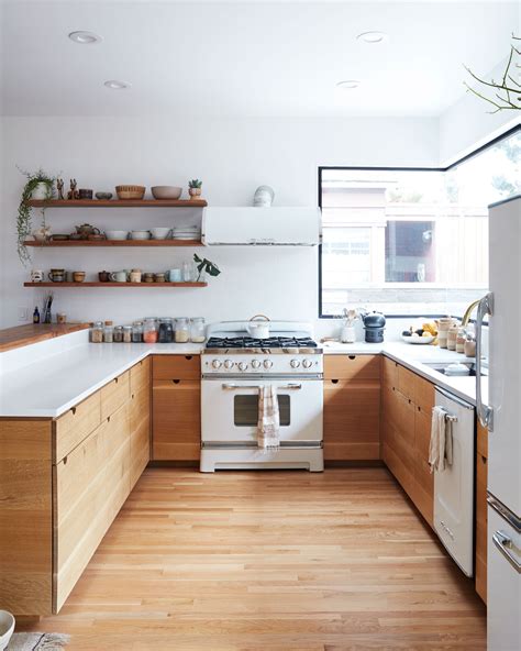 wood cabinets with white appliances